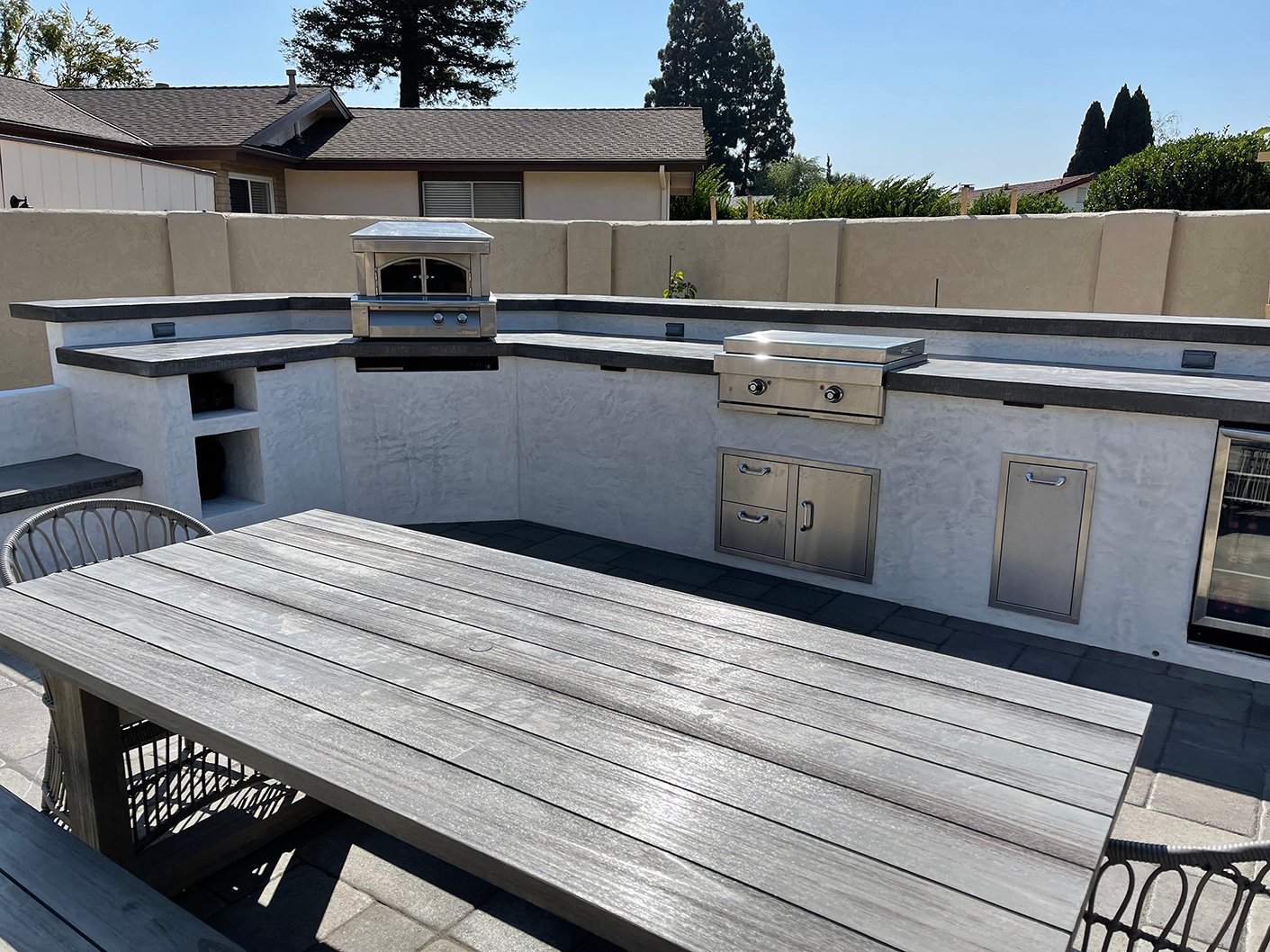 Outdoor kitchen BBQ pit and grill station