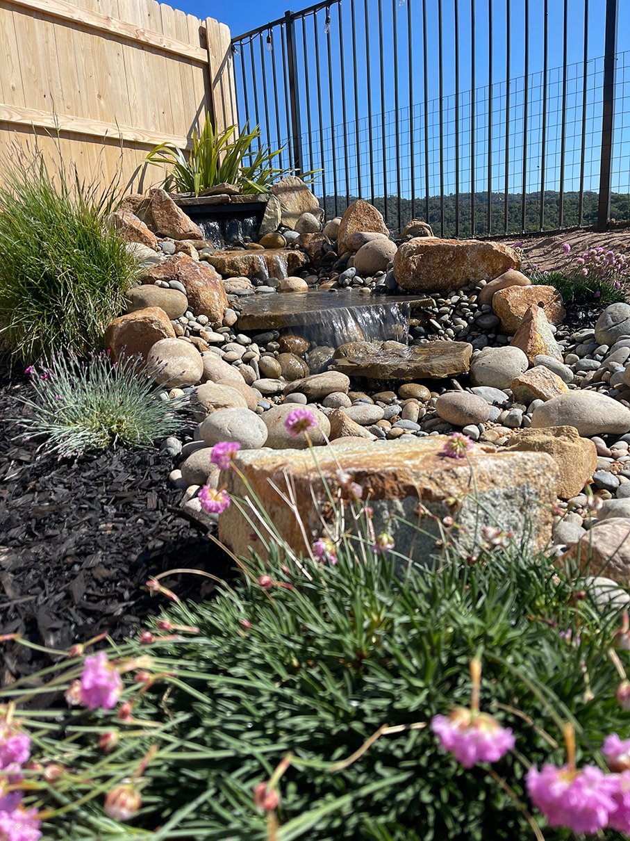 Custom backyard waterfall water feature